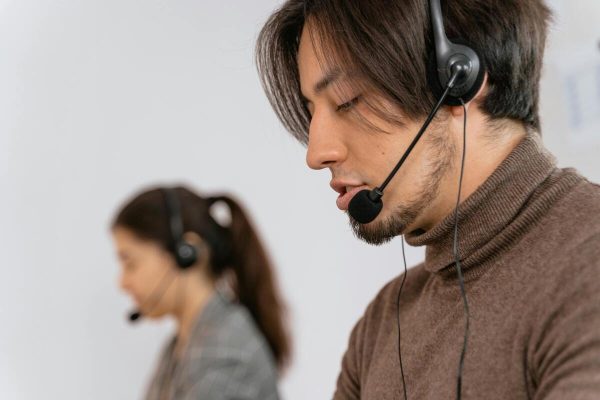 Multilingual customer service agent taking calls