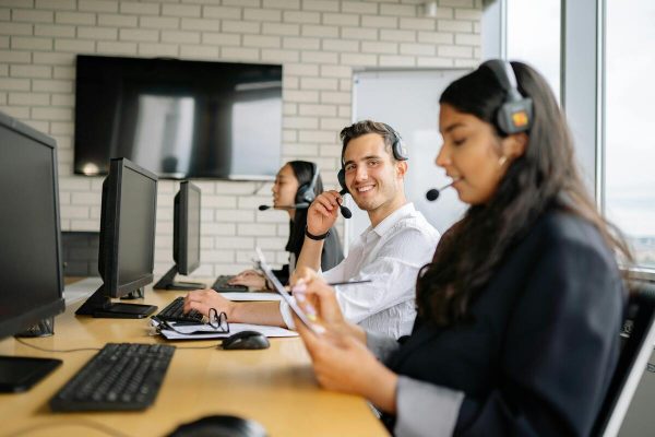 Customer support team handling calls facing customer service challenges